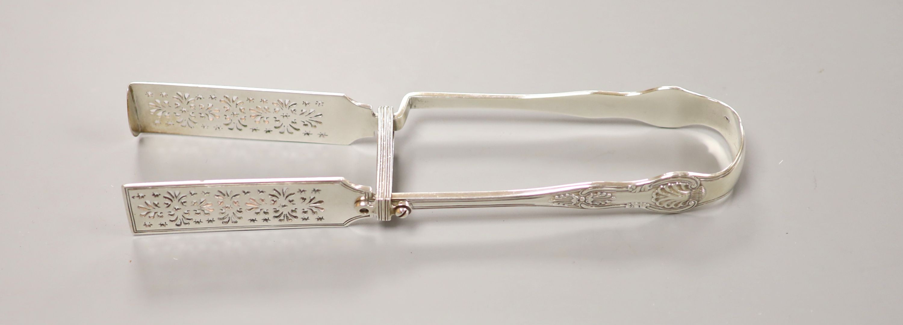 A pair of Victorian silver Kings pattern asparagus servers, George Adams, London, 1871, 25.3cm, 212 grams.